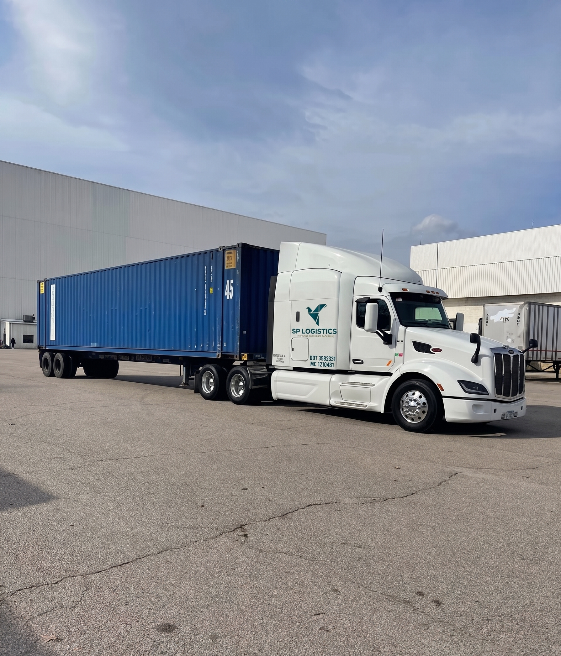 SP Logistics truck and container at facility