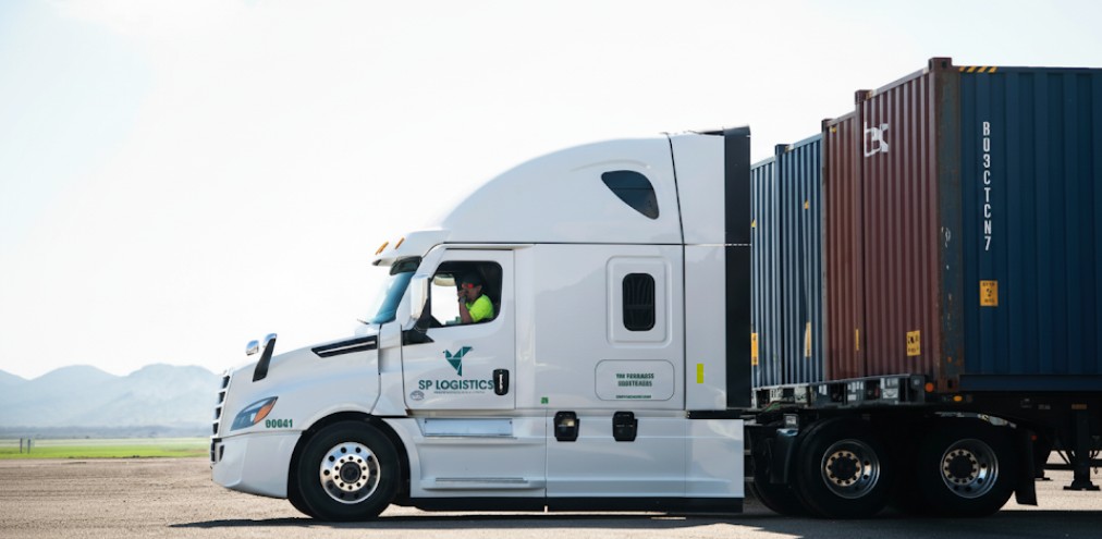 SP Logistics drayage truck hauling containers in the Pacific Northwest