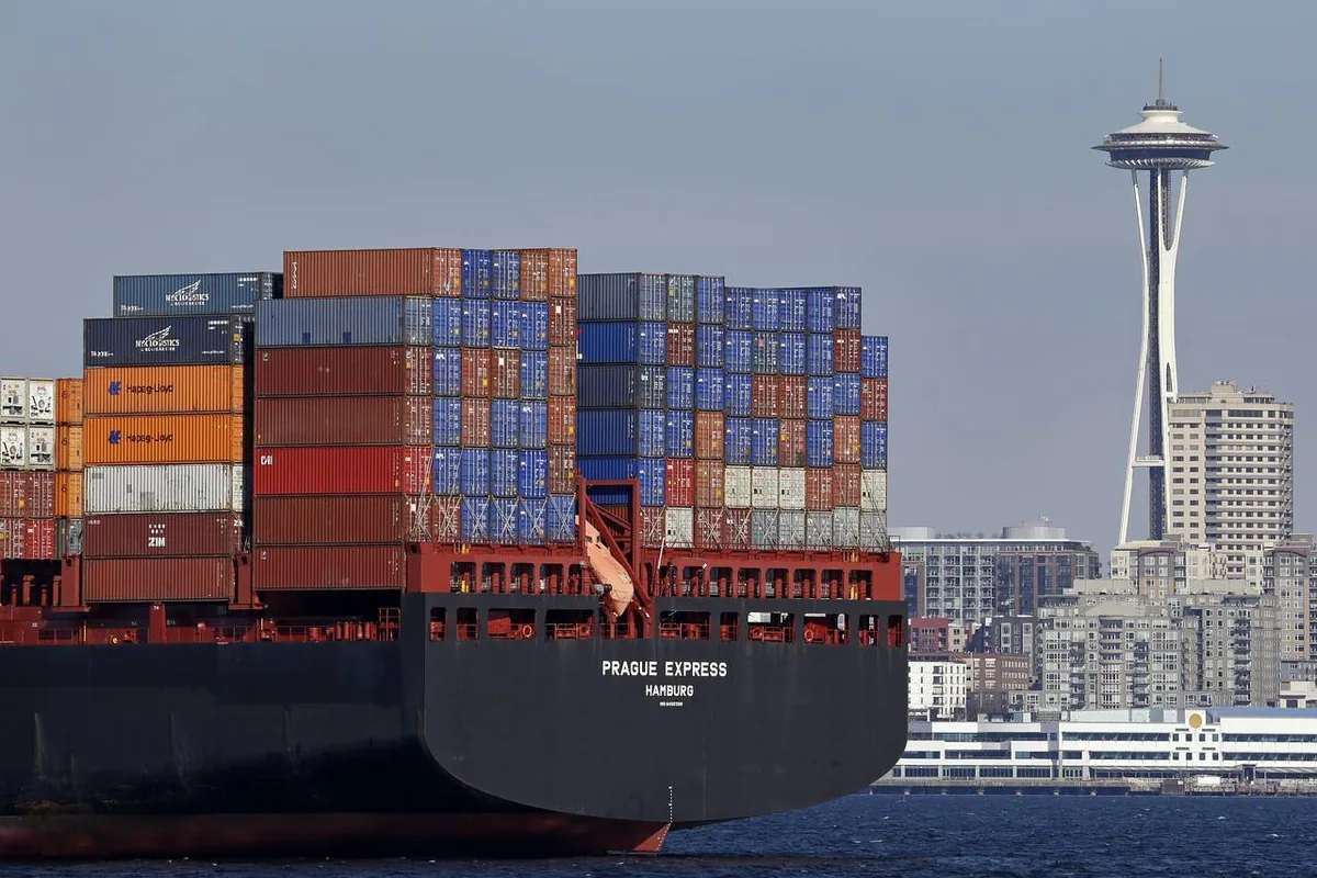 Container vessel passing the Seattle skyline and Space Needle