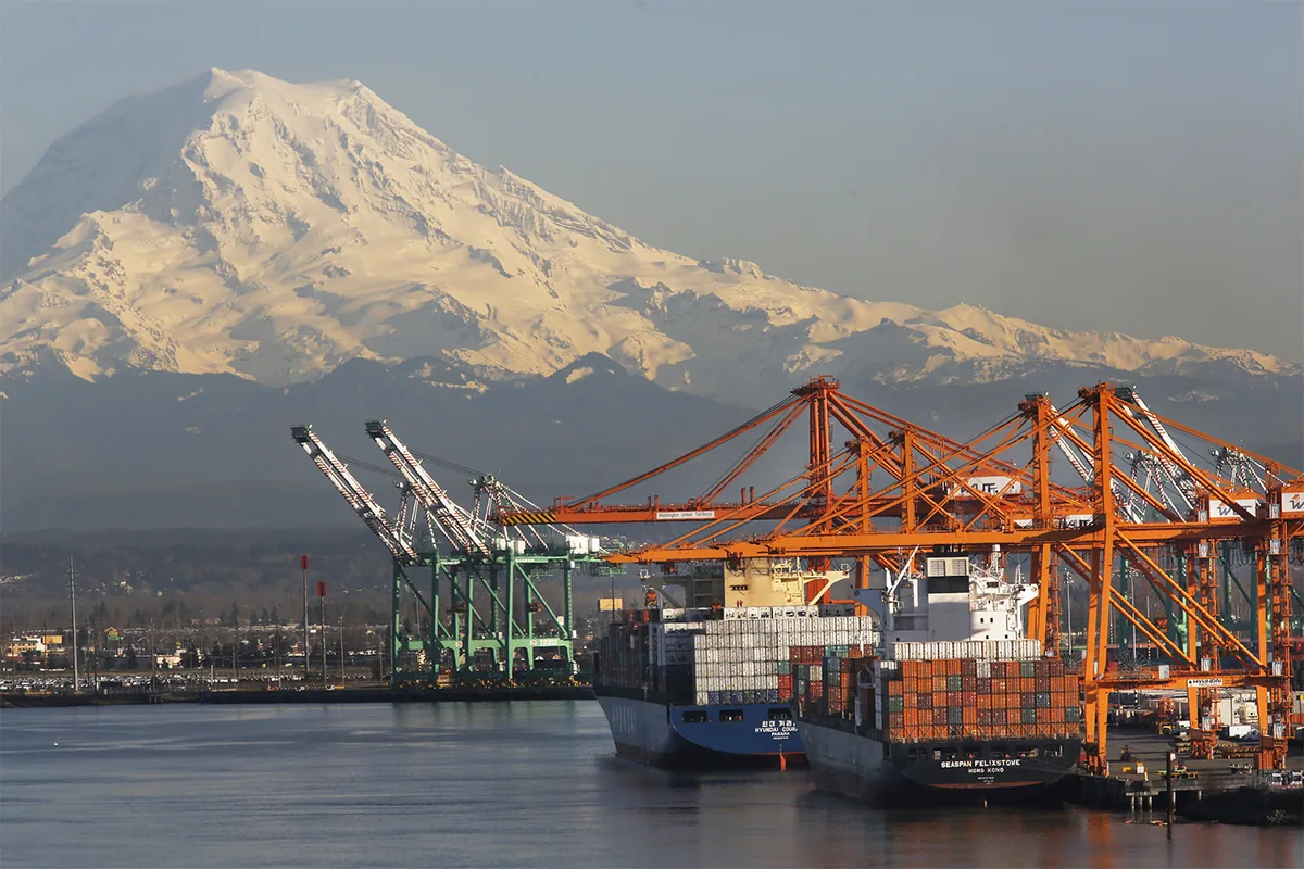 Washington United Terminals cranes and container vessels with Mount Rainier